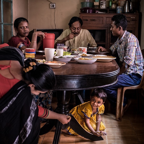 In Bangladesh, Amena Akhter makes sure that her daughter, Hafsa Khatun eats vegetables during the family’s varied and nutritious lunch time meal