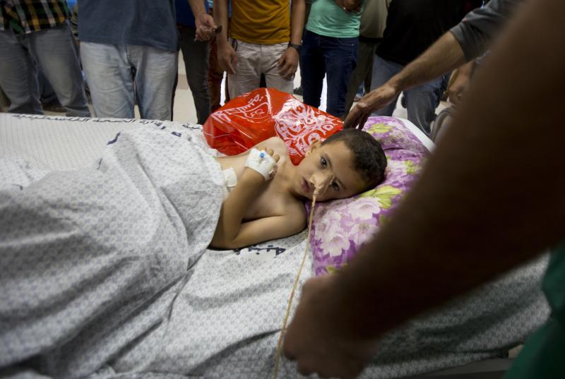 Kinan, 5, was injured during an Israeli air strike. 