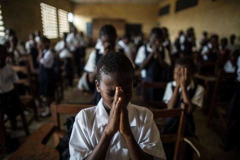 liberia-classroom-children-pray-uni196041-med-res.jpg