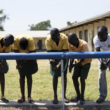 Children wash their hands at a UNICEF supplied WASH station