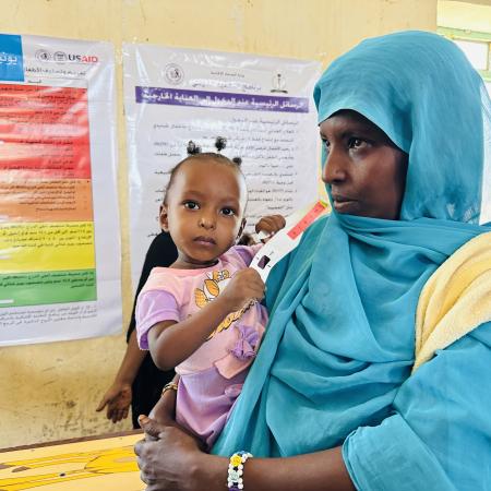 On 24 May, mothers and children attend a mobile clinic organized by UNICEF and Patients Helping fund (PHF) in Silkiy locality, a hard-to-reach area in Kassala state.
