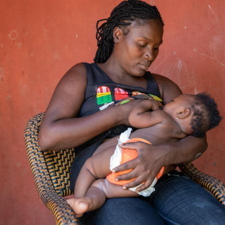 30-year-old Josena Alditor breastfeeds her 7-month baby boy Marc Carlo in Cap Haitien, Haiti.