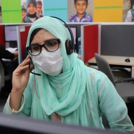 A community volunteer at the helpline offices.