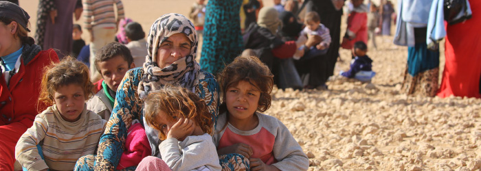 Woman sitting with children