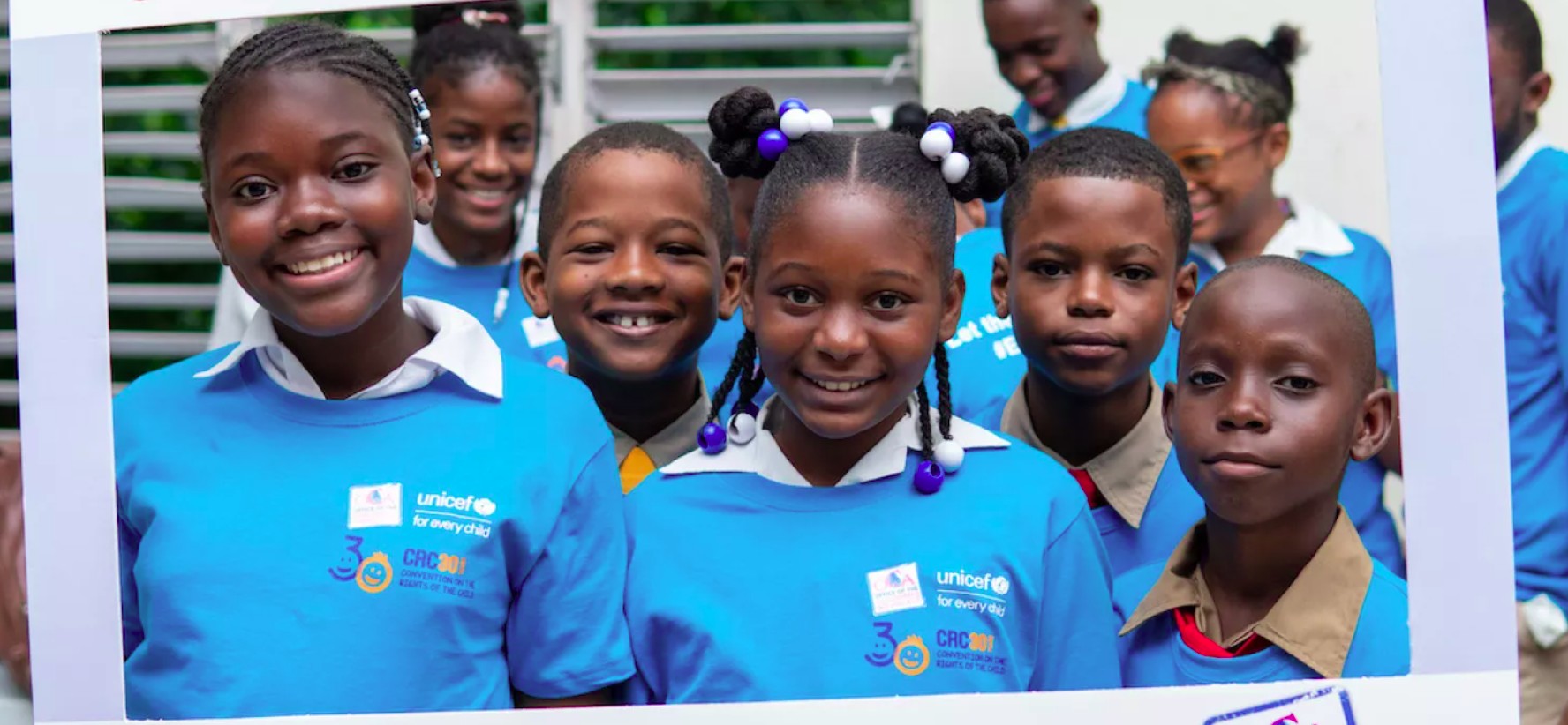 Students in Jamaica smiling together