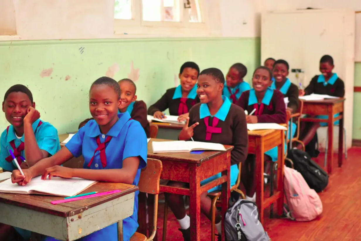 Students at their desks in a classroom in Zimbabwe