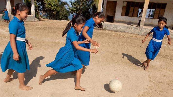 Girls playing soccer