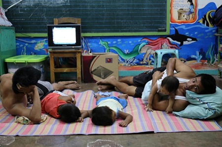 Typhoon Hagupit: families find shelter as they brace for the storm ...