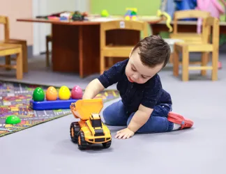 child playing with a toy