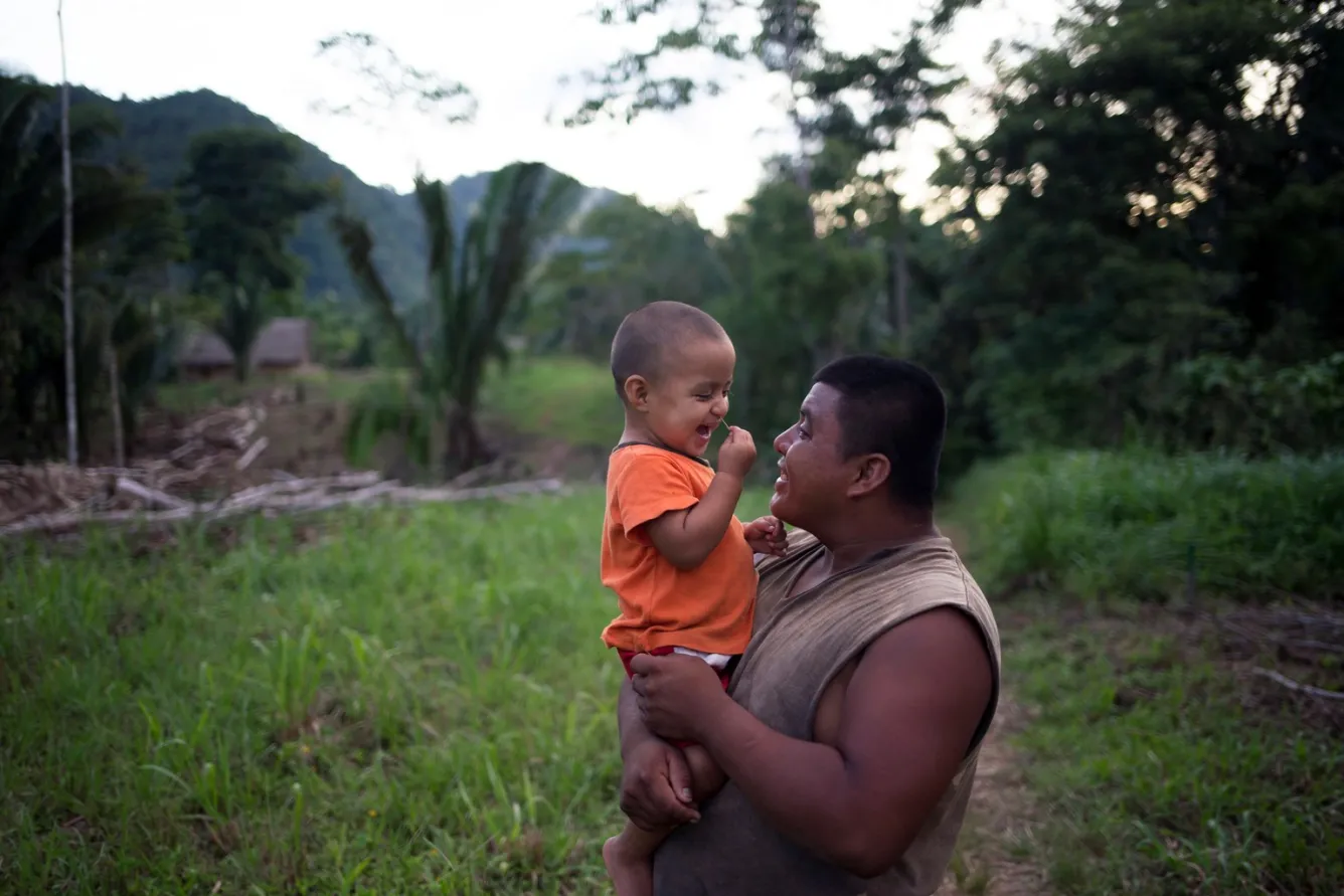 Two-year-old Abner and his father, James Choc.