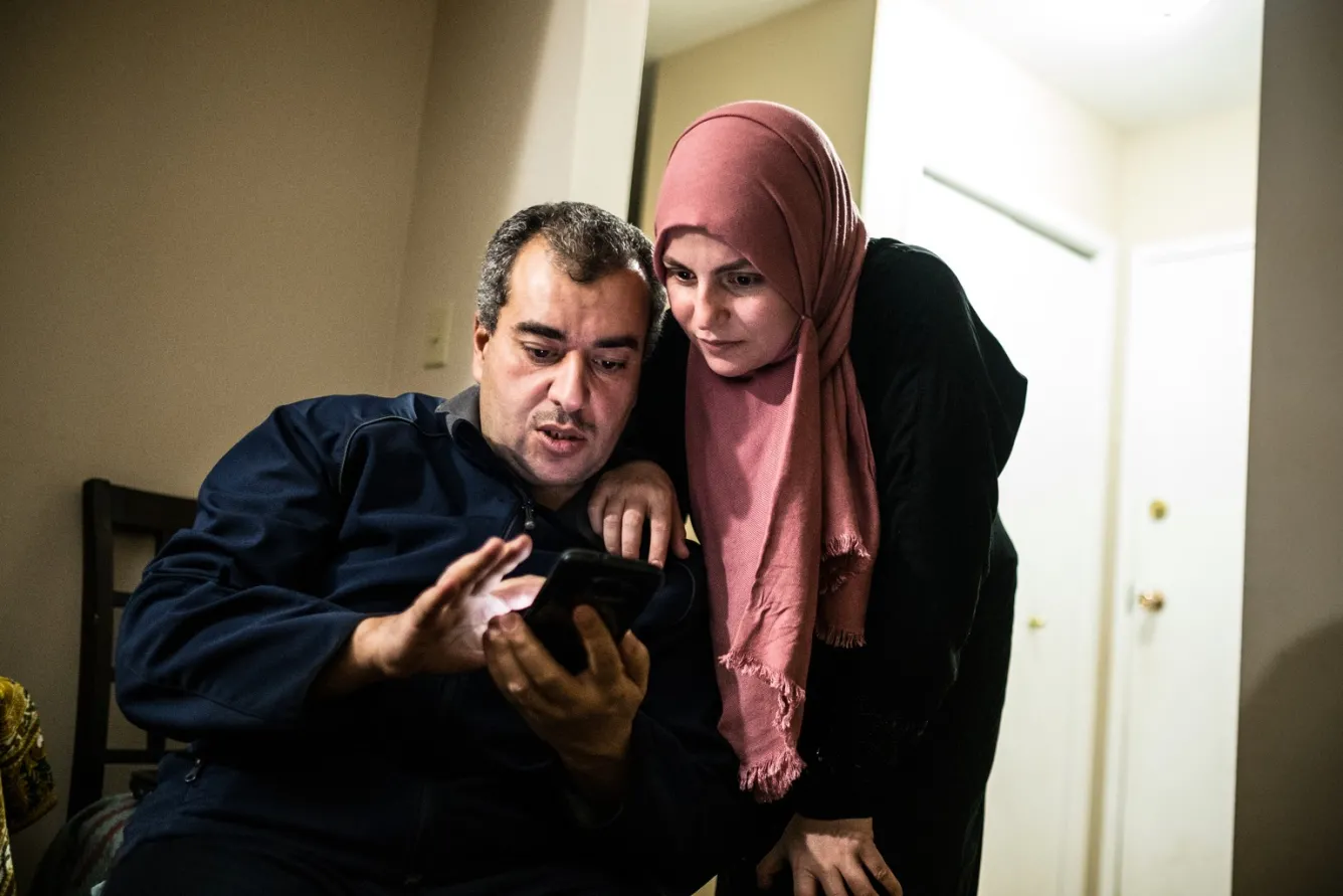 The couple uses the smart phone they own to set up appointments.