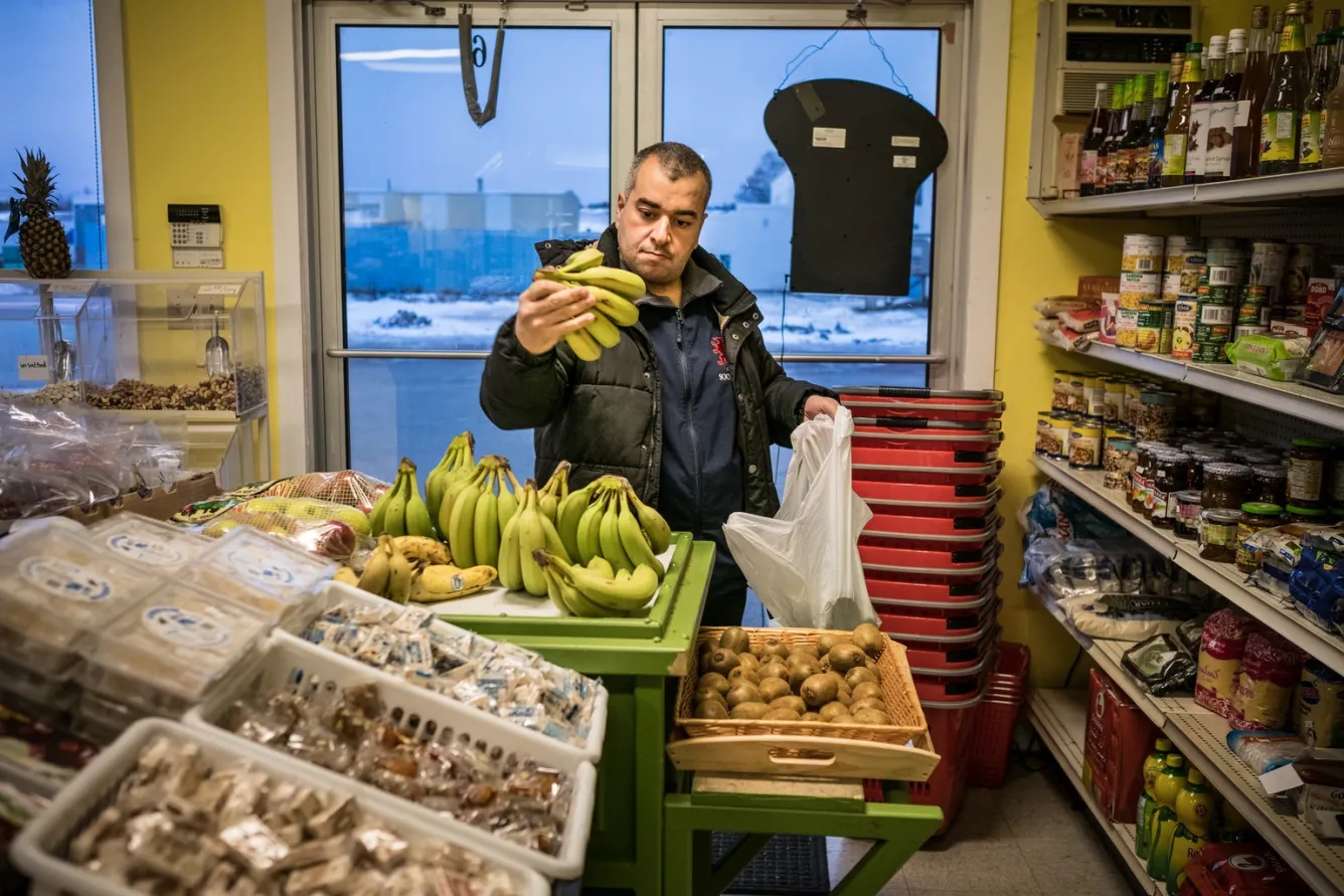 Mr. Alrashdan shops in a small Middle-Eastern supermarket in their community. 