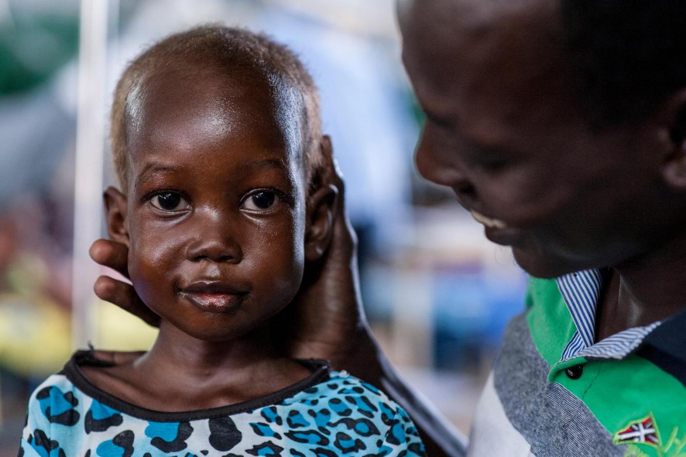 Nyajime's father holds up her head