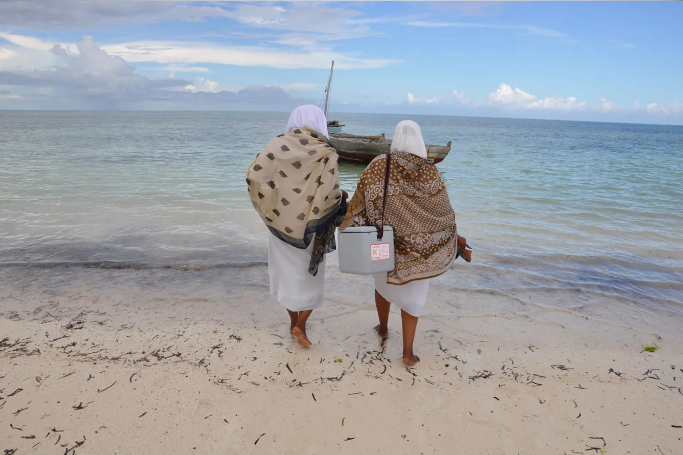 Health workers deliver vaccines to children on the island of Zanzibar