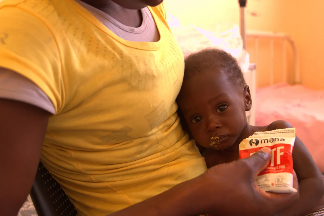 Child eating Plumpy`Nut