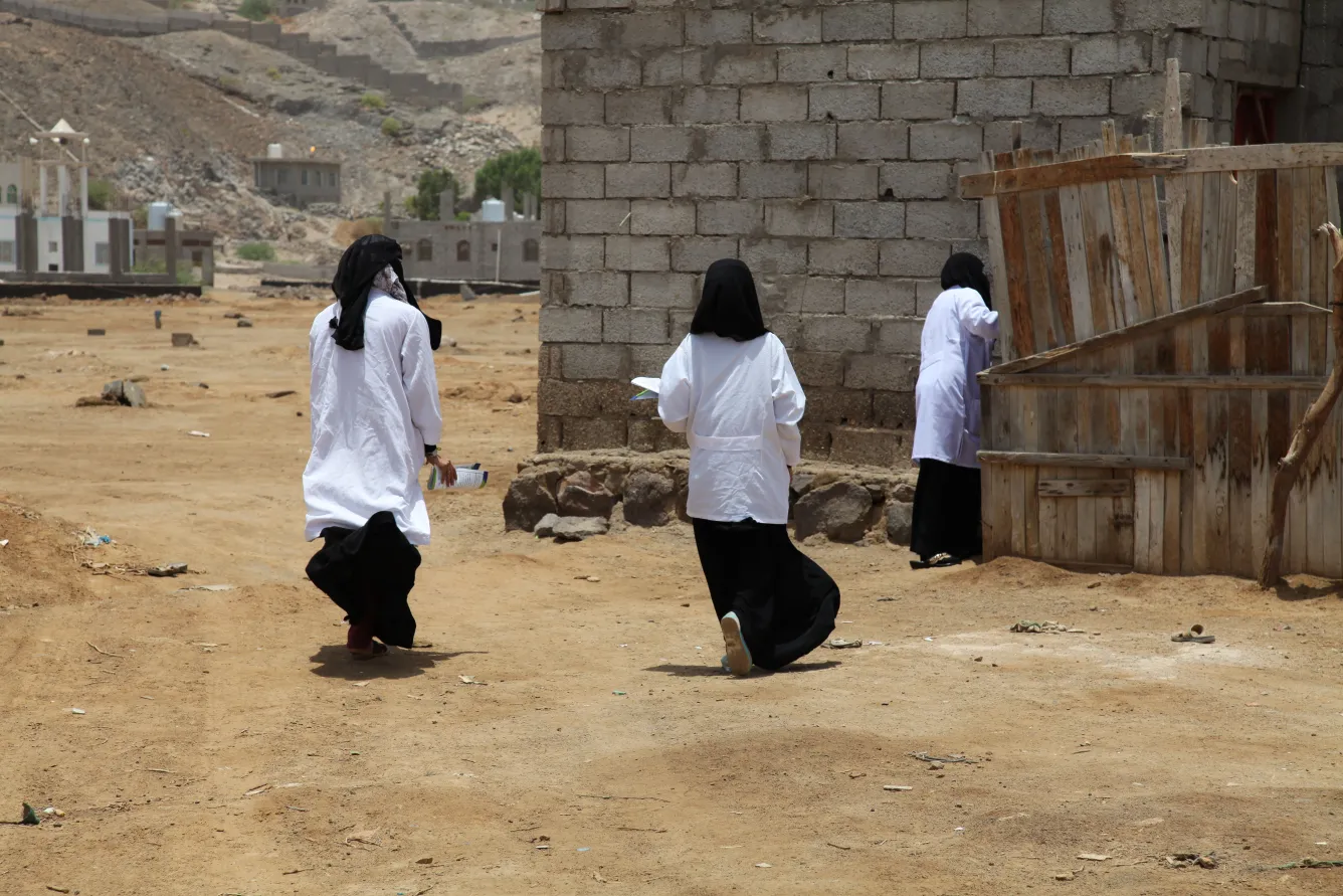 community volunteers knock on doors in the neighbourhood