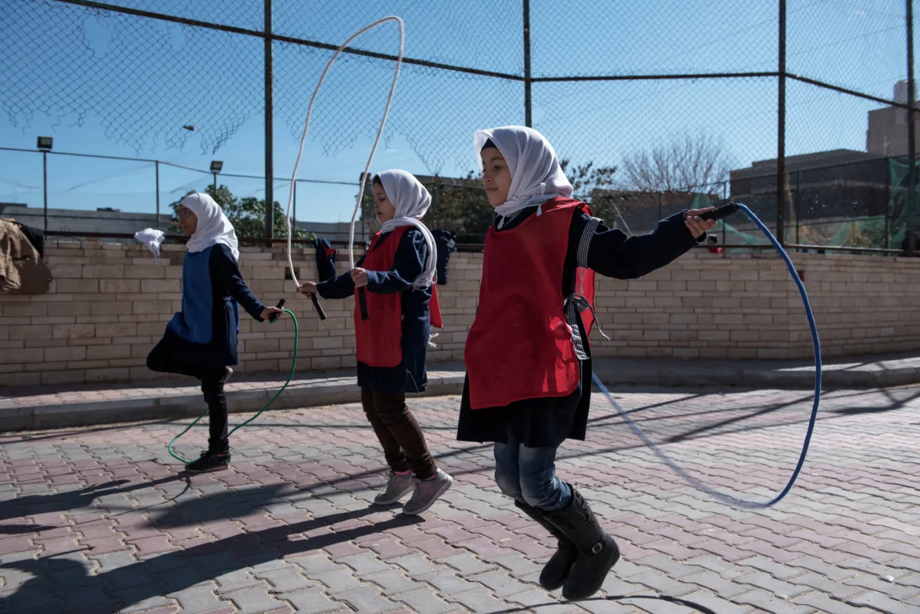 children skip rope in Libya