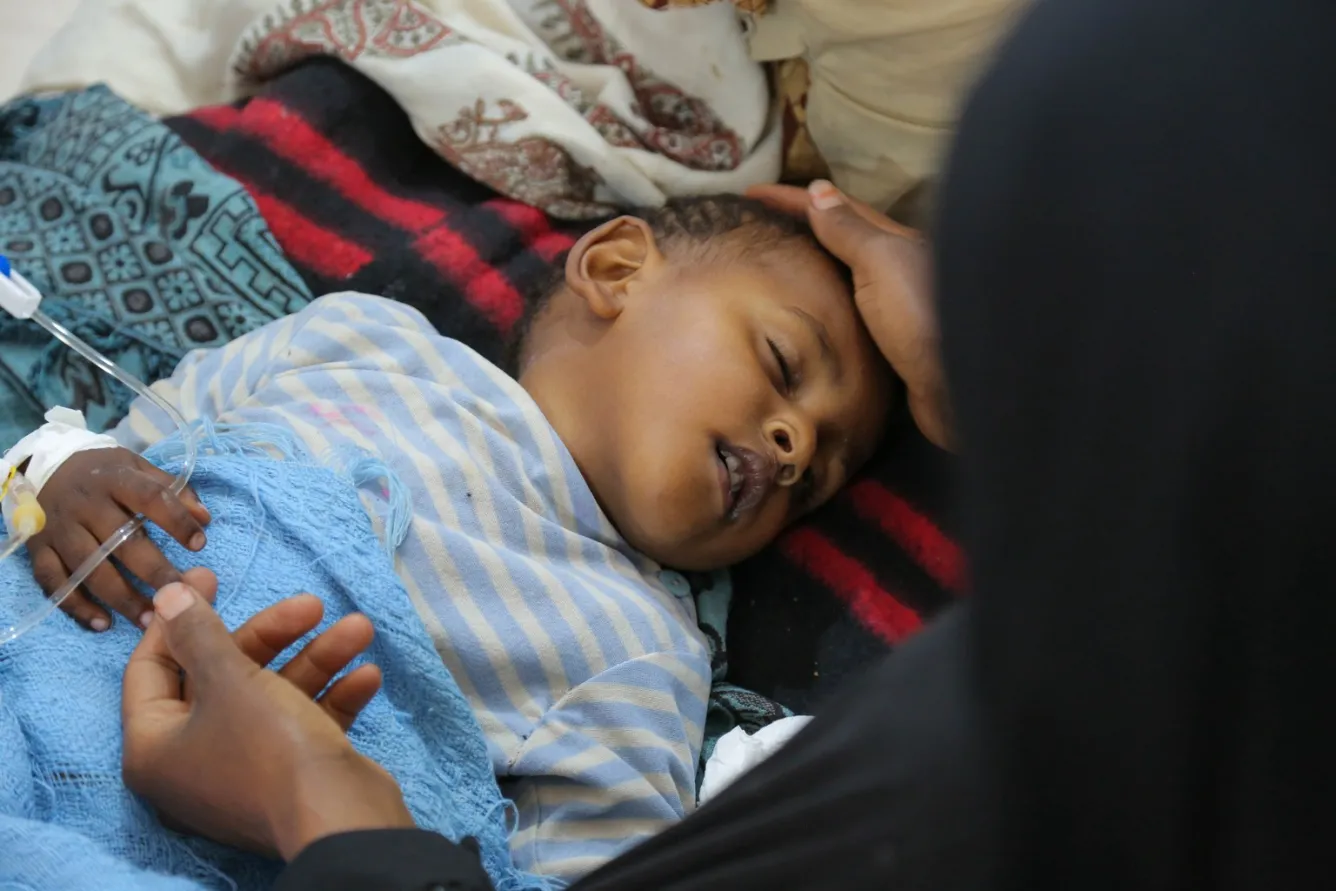 a child and his mother in Yemen