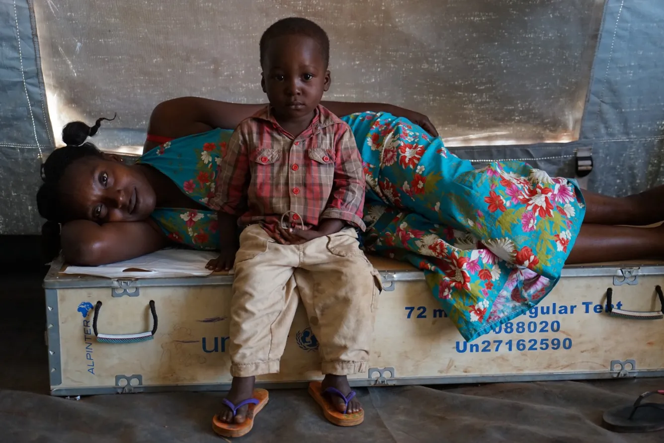 a child and his mother in Angola