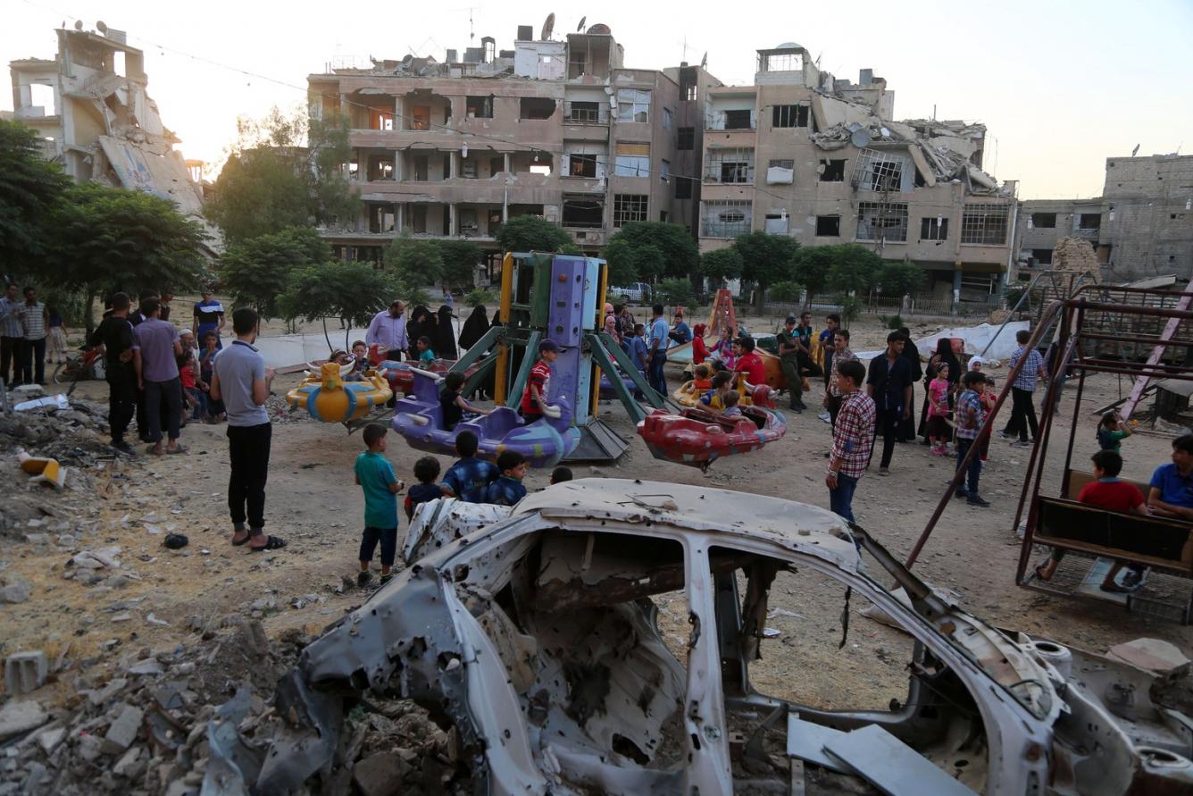des enfants Ghouta jouent à l’occasion des célébrations de l’Eid al-Fitr