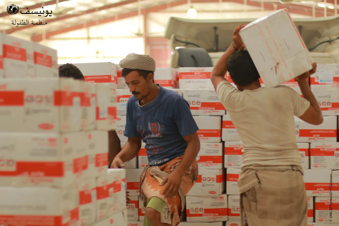 Medical supplies are loaded onto a truck.
