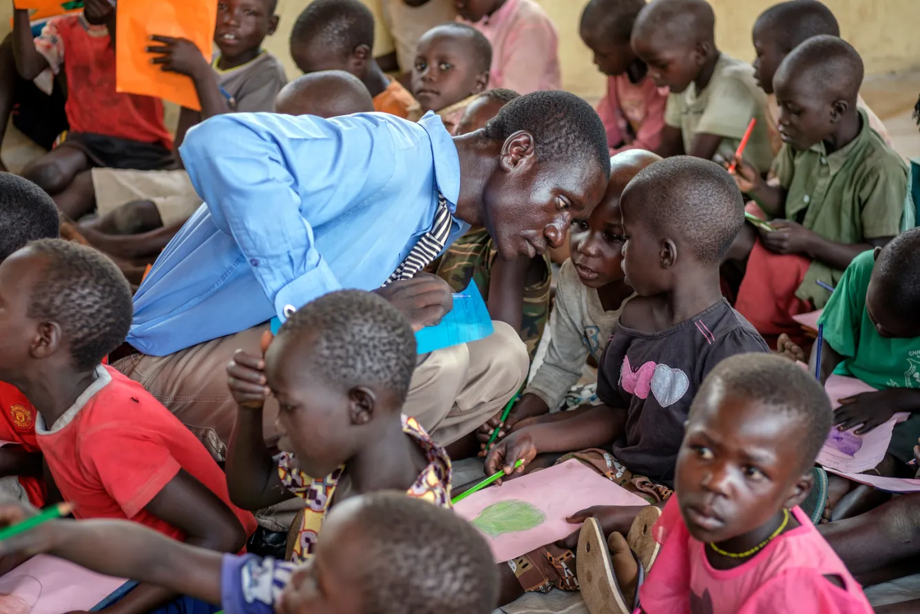 a teacher speaks with a student