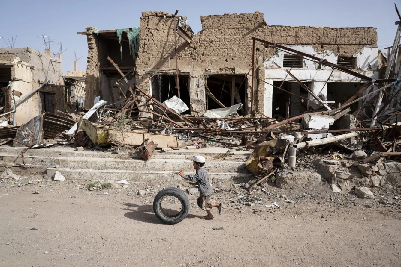a boy plays in Yemen