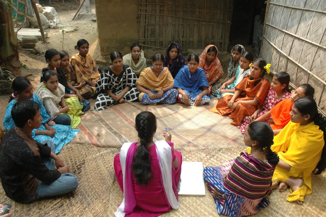 a circle of young women in Bangladesh