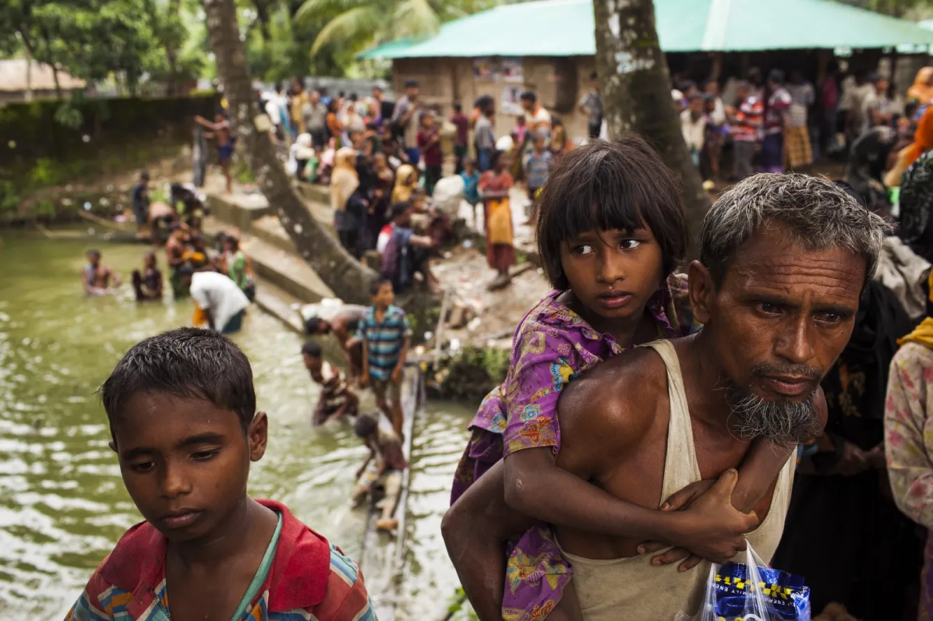 a Rohingya family takes refuge