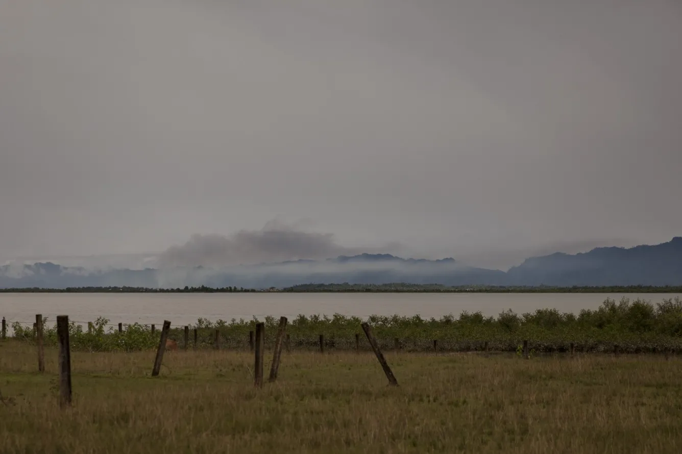 smoke rises from the burned villages in Myanmar