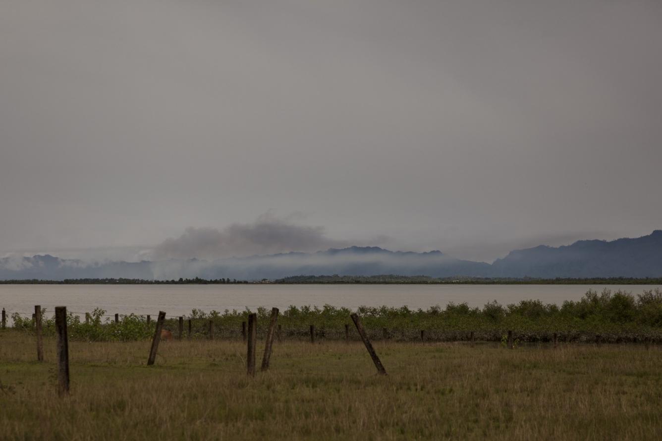 smoke rises from the burned villages in Myanmar