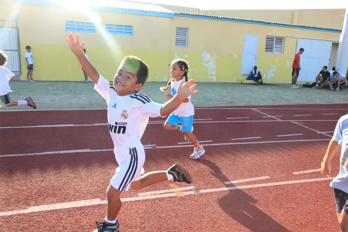  a child running a race