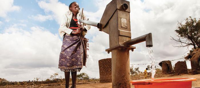 Girl with water pump