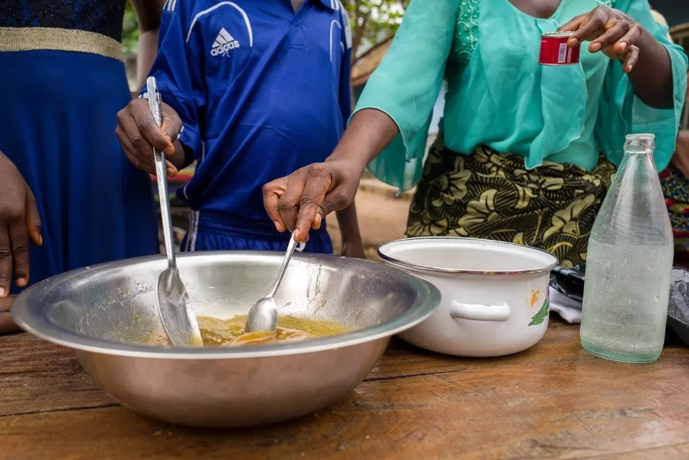 children in a cooking class at the transition centre