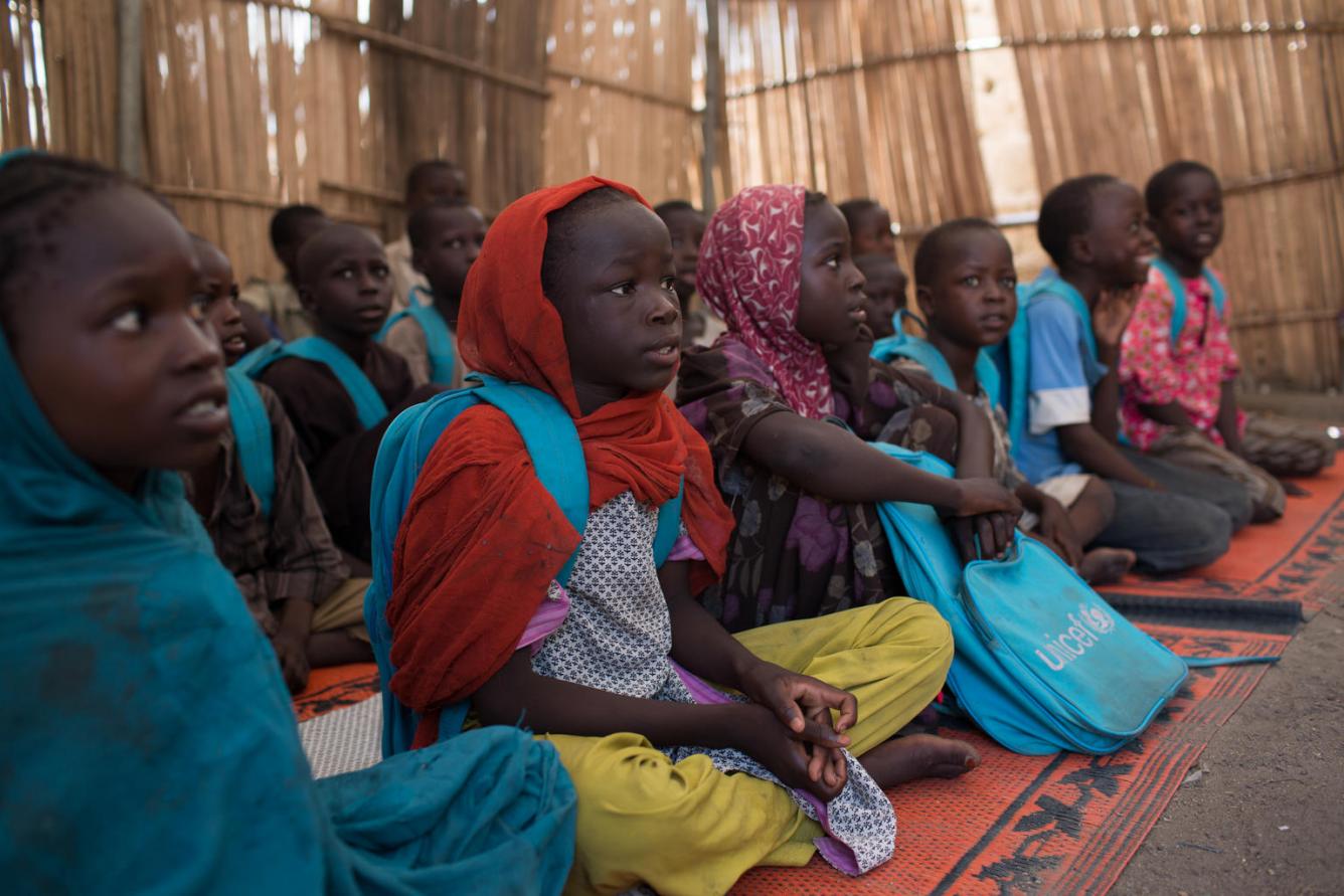 Children attend school in the town of Banki