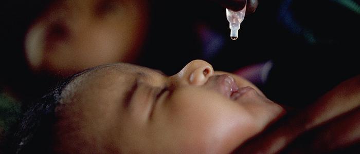 baby receiving a polio vaccine