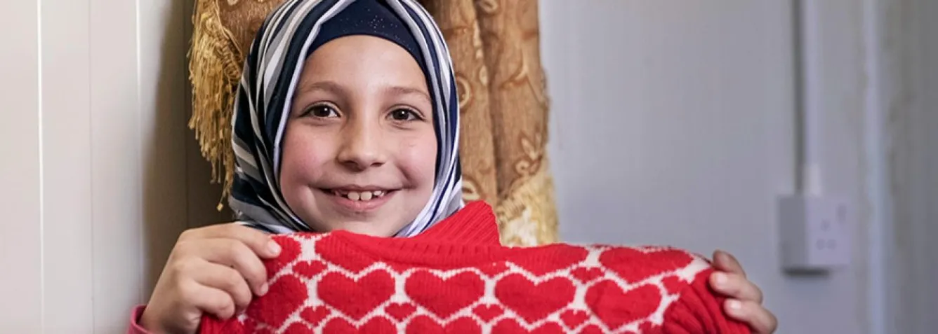Living in a Jordan refugee camp, 9-year-old Lama received her favourite sweater through our donor-supported winterization program. Read her story in this fall newsletter.