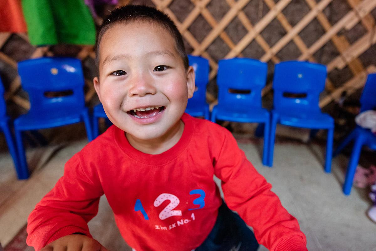 A child plays and learns at an early childhood development center, supported by UNICEF, in Mongolia.