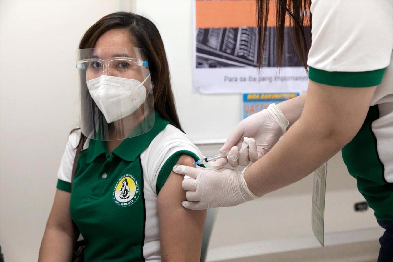 A nurse in Philippine receiving the COVID-19 vaccine through the COVAX Facility.