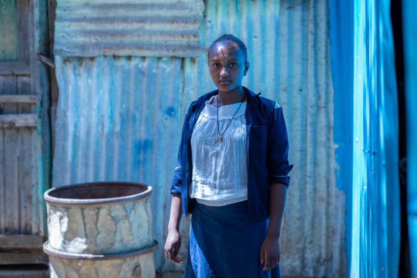 In addition to her studies, 15-year-old Tsion does most of the cooking at home.