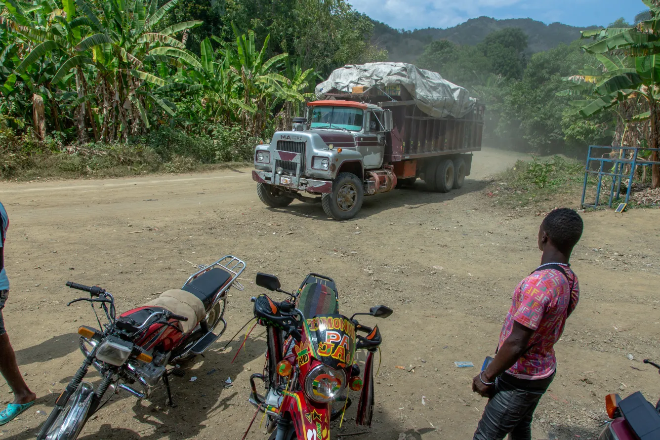 A truck full of school kits arrives in Les Irois, in Grand'Anse. From there, motorcycles and mules will transport them to remote schools in the commune.