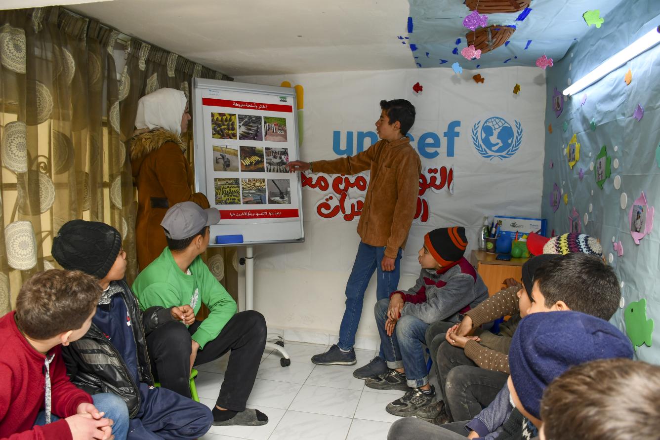 Mohammed, 15, participates in an education session on explosive ordnance at a UNICEF-supported child-friendly space in Bseimeh village, Rural Damascus, Syria