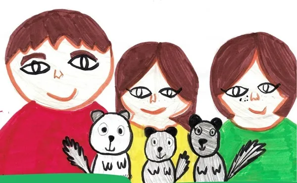 Dessin d’une enfant avec sa famille. Sous le dessin figure le texte suivant : « Je rêve que ma famille soit toujours réunie. »