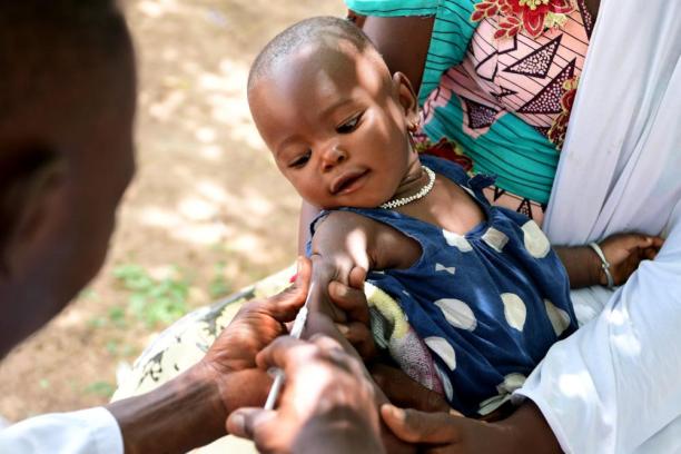 A baby is vaccinated in Boulpore, Burkina Faso.