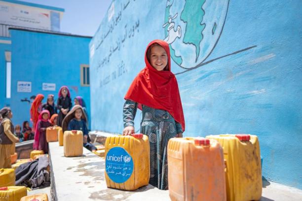 Eight-year-old Hatima is photographed at a UNICEF-supported water point in Noorkhail village, Muqur District in Badghis Province, Afghanistan.