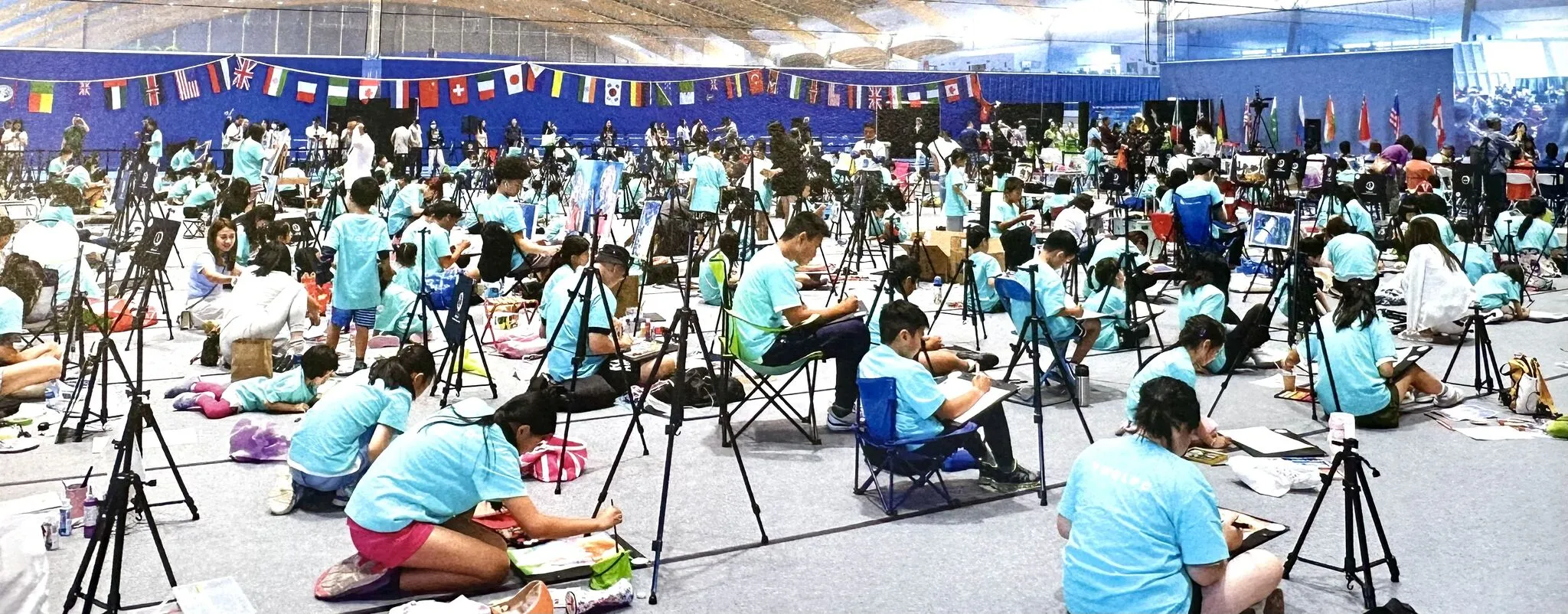 Children painting during a painting olympics in Vancouver. 