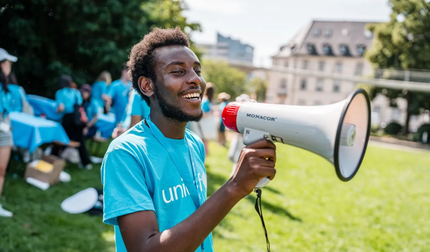 A youth speaking through microphone