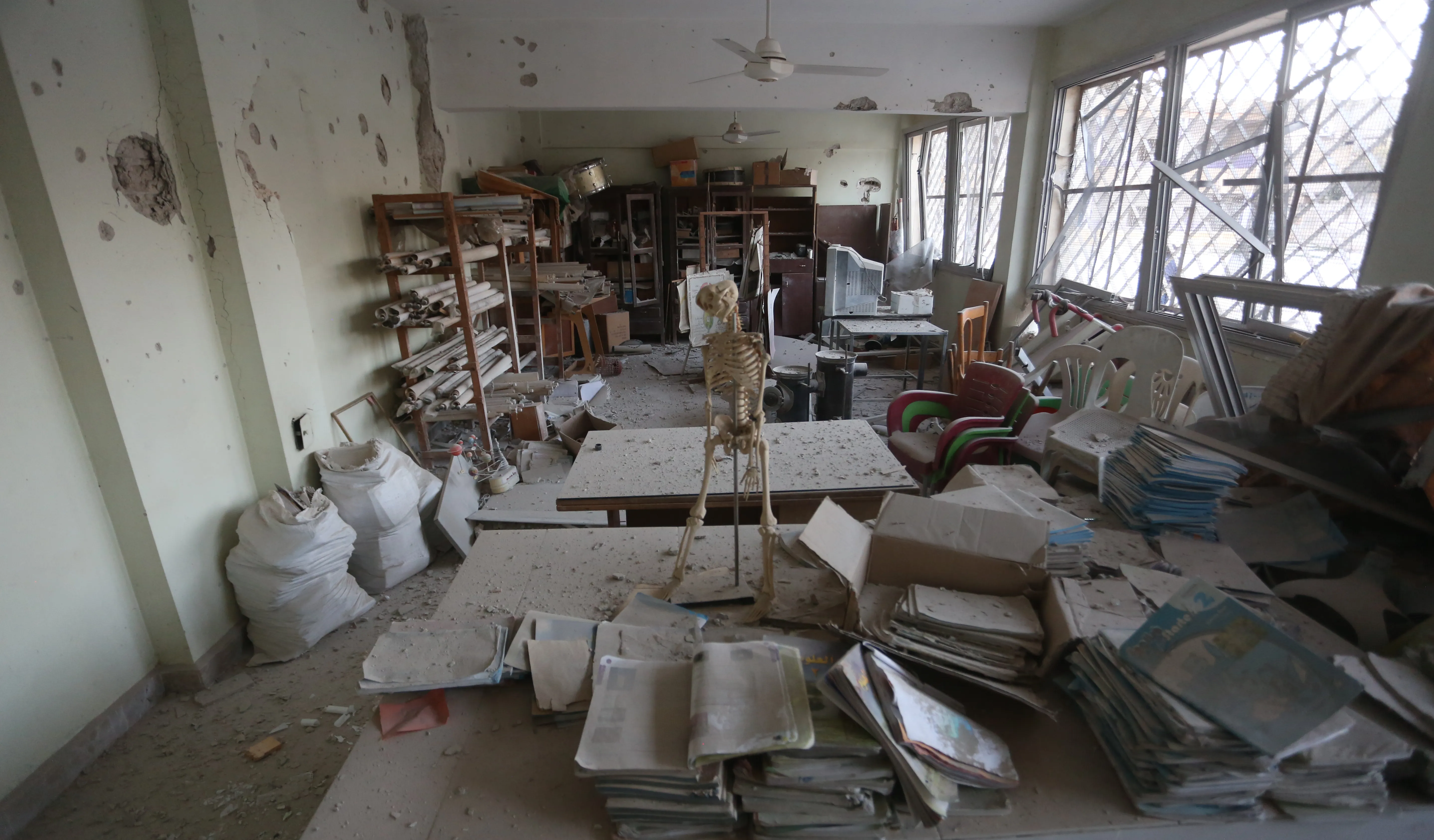 A classroom in Idlib is in ruins following an attack.
