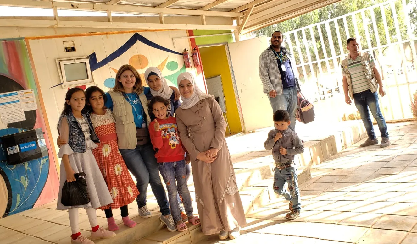 Bayan Yammout with school children in Zaatatri, Jordan.