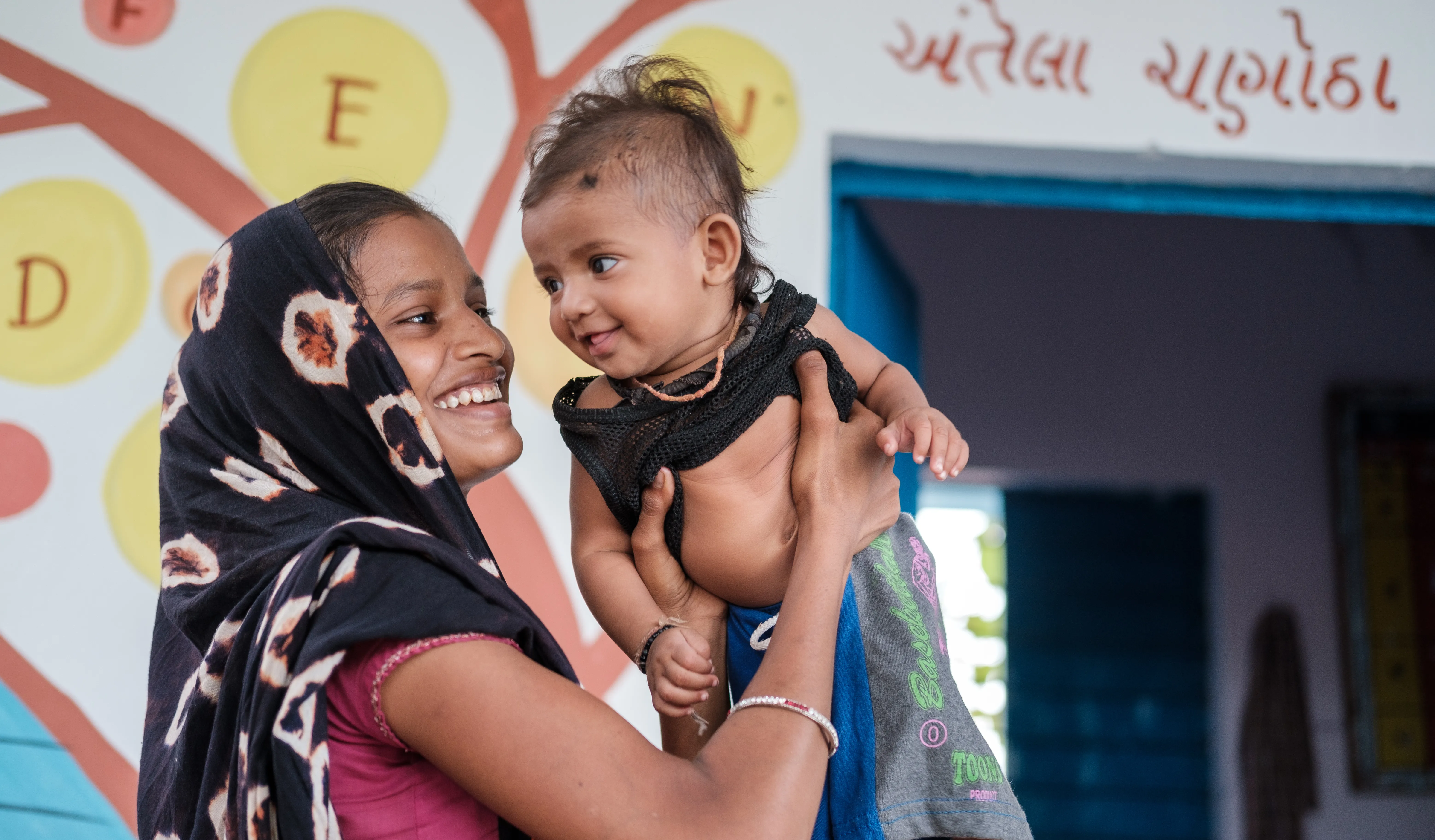 A happy Naina Patel with her daughter at Mamta Diwas(VHND) at Chanota Fadia, AW Baria, Gujarat as routine immunisations and checkups resume post covid lockdown